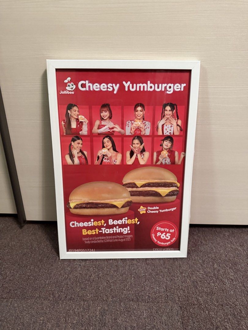 Jollibee Cheesy Yumburger Framed Poster (Category: Art & Prints) located in Caloocan City. Submitted by preloveditemsbyyana (Listing ID 1455233985, Image 1). Description: - Framed Jollibee Cheesy Yumburger poster - Features the Double Cheesy Yumburger and some girls - Ideal for Jollibee fans and collectors - Comes with a white frame - Ready to hang.