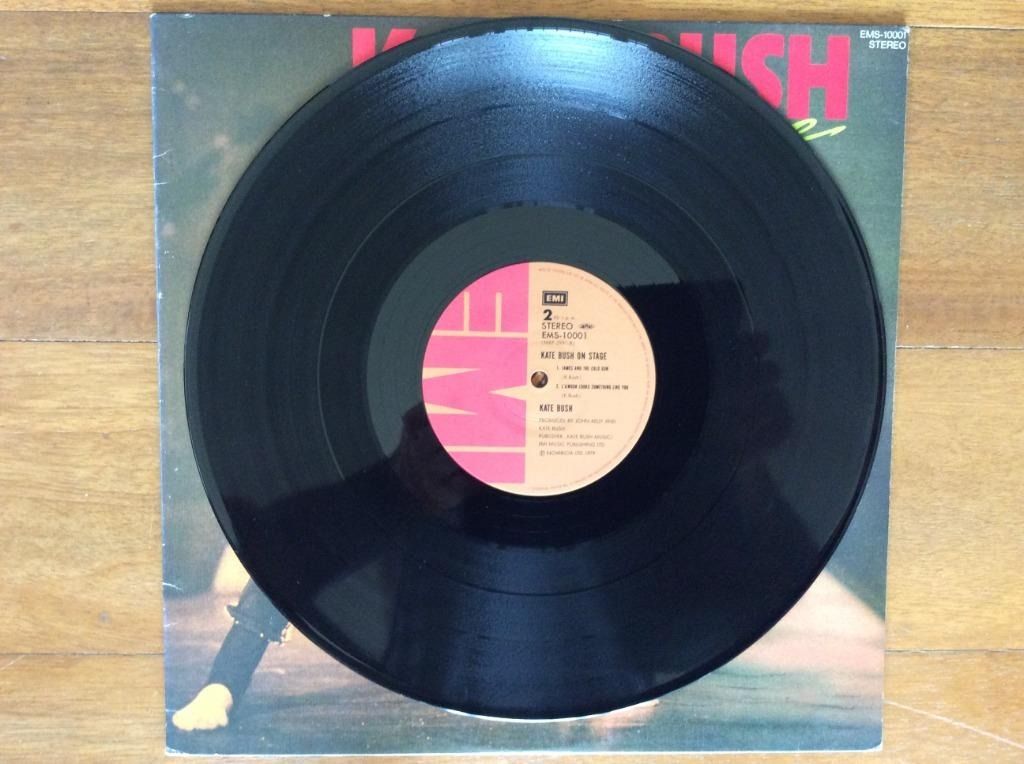 Kate Bush On Stage Vinyl Record LP (Category: Vinyls) located in Silang. Submitted by lorenzo0000 (Listing ID 1455171069, Image 1). Description: - Kate Bush 'On Stage' vinyl record - Features live performances - Includes tracks like 'Them Heavy People' and 'James and the Old Gun' - A must-have for any Kate Bush fan.