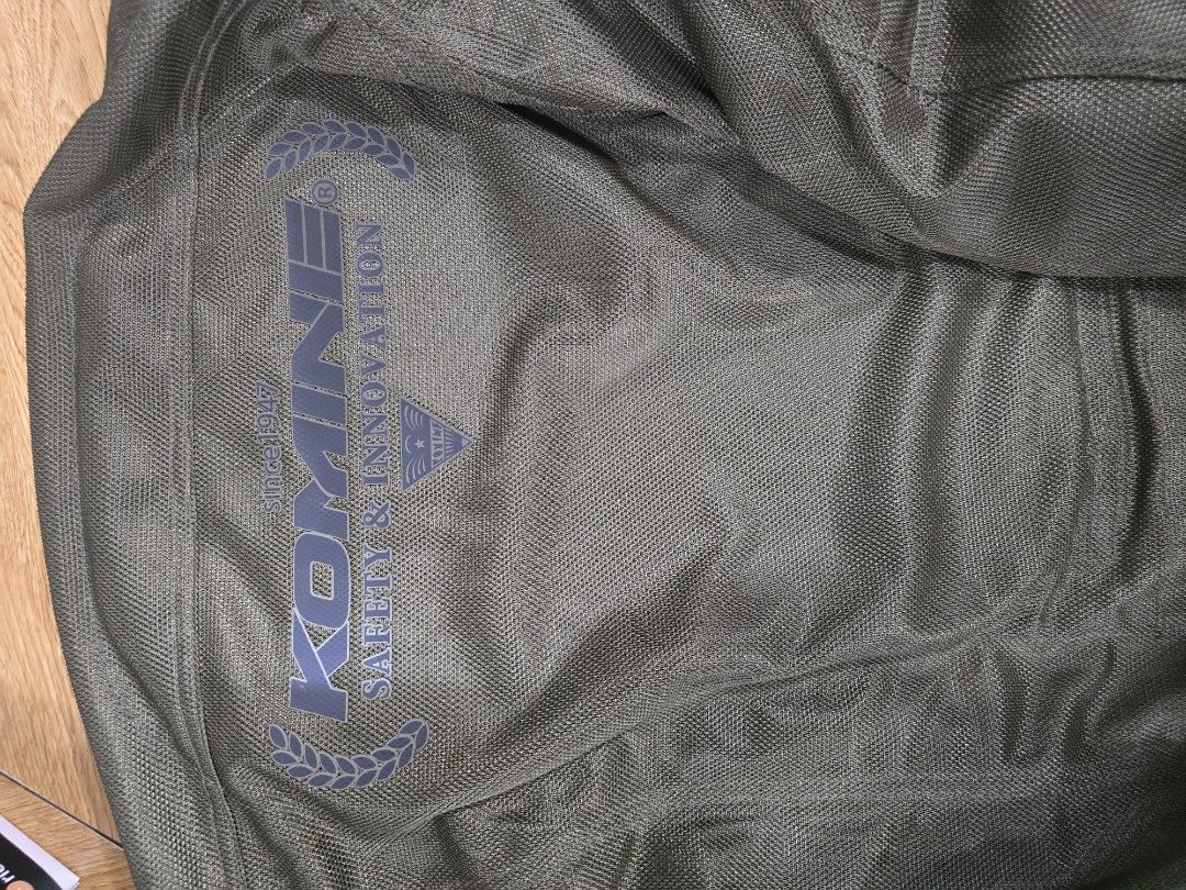 Komine Motorcycle Jacket Mesh Riding Gear 2XL (Category: Coats, Jackets and Outerwear) located in San Juan City. Submitted by pilatus17 (Listing ID 1455321781, Image 2). Description: - Komine Mesh Motorcycle Jacket - Color: Olive Green with Black Stripes - Size: 2XL - Designed in Tokyo - CE Approved Protection - Functional Zippers and Pockets - Ready for your next ride!.