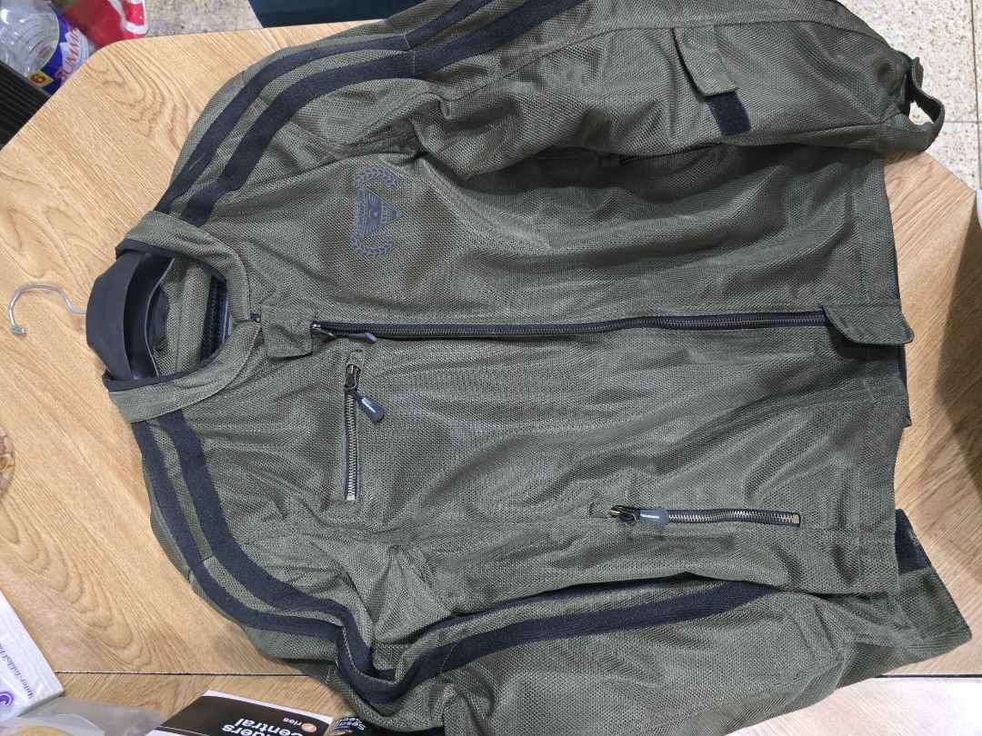 Komine Motorcycle Jacket Mesh Riding Gear 2XL (Category: Coats, Jackets and Outerwear) located in San Juan City. Submitted by pilatus17 (Listing ID 1455321781, Image 1). Description: - Komine Mesh Motorcycle Jacket - Color: Olive Green with Black Stripes - Size: 2XL - Designed in Tokyo - CE Approved Protection - Functional Zippers and Pockets - Ready for your next ride!.