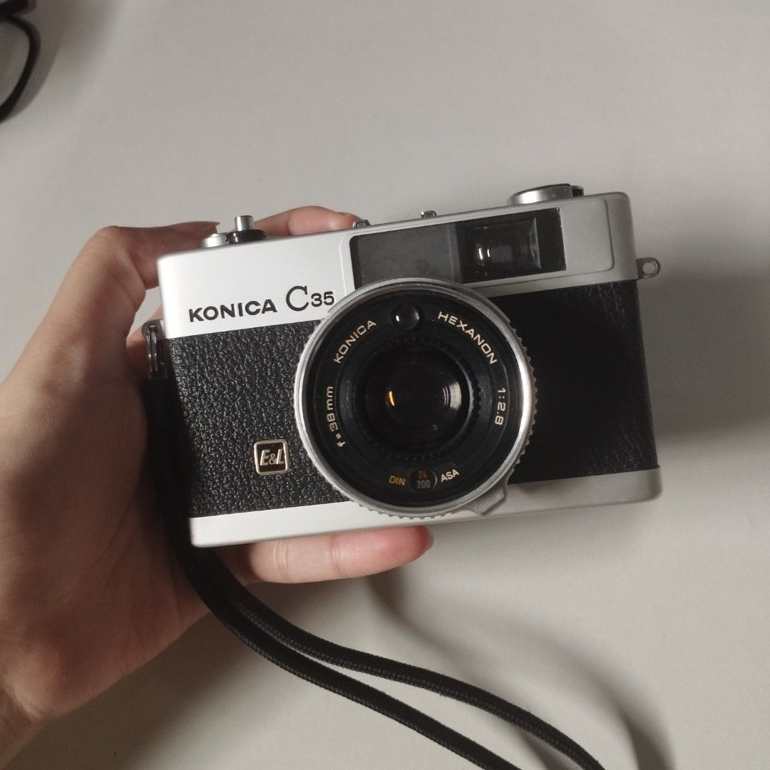 Konica C35 E&L Film Camera (Category: Cameras) located in Bustos. Submitted by gemicarts (Listing ID 1455176604, Image 1). Description: KONICA C35 FILM CAMERA | ₱3,800 RUSH SALE Selling my Konica C35 vintage film camera🩶 Perfect for film photography, collectors, or anyone looking for a classic compact camera. • RFS: need money asap • Good Condition • Working & film tested last year pa • Free batt & flash 📍 Location: Bustos, Bulacan 📦 Shipping 