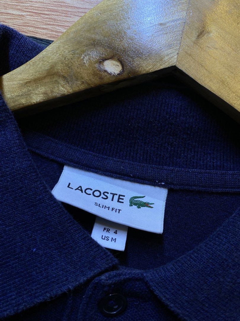 LACOSTE POLO SHIRT (Category: Tshirts & Polo Shirts ) located in Makati City. Submitted by drip.poww (Listing ID 1455311536, Image 3). Description: - Authentic Lacoste - Color: Navy Blue - Size: Large - Dimes: 23x28 - Authentic - Excellent condition - Need wash, fresh from bale - Material: 100% Cotton Please don’t expect too much—these are thrifted (ukay) items. 😊 !!STILL NEGOTIABLE!!.