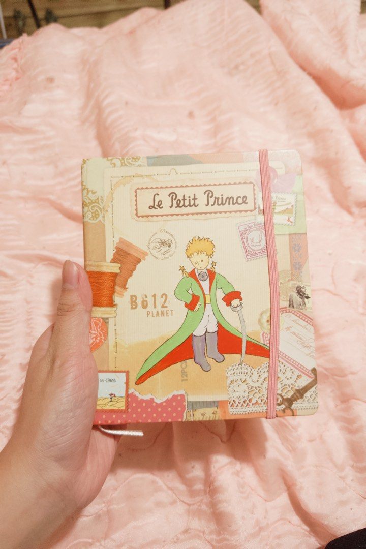 Le Petit Prince Hardbound Journal Notebook (Category: Stationery & School Supplies) located in Manila. Submitted by ashleylazarte (Listing ID 1455216767, Image 2). Description: Hi for those interested just message me, you can haggle especially if you buy more ^^ Condition: Brand New Details: - Lined pages with Bible verses. - Features an elastic closure. - No pages have been written on. - Stored properly and kept in good condition. Please review 