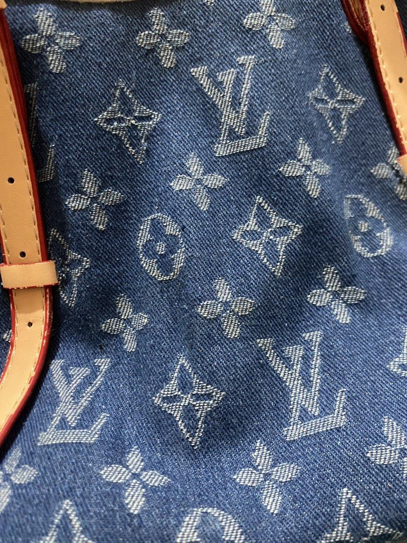 Louis Vuitton Denim Monogram Tote Bag (Category: Luxury Bags & Wallets) located in Manila. Submitted by new.sheenaa (Listing ID 1455225684, Image 2). Description: - Classic Louis Vuitton monogram print on denim - Tan leather handles and trim - Secure zipper closure at the top - Adjustable side straps for customized fit - Ideal everyday tote bag.