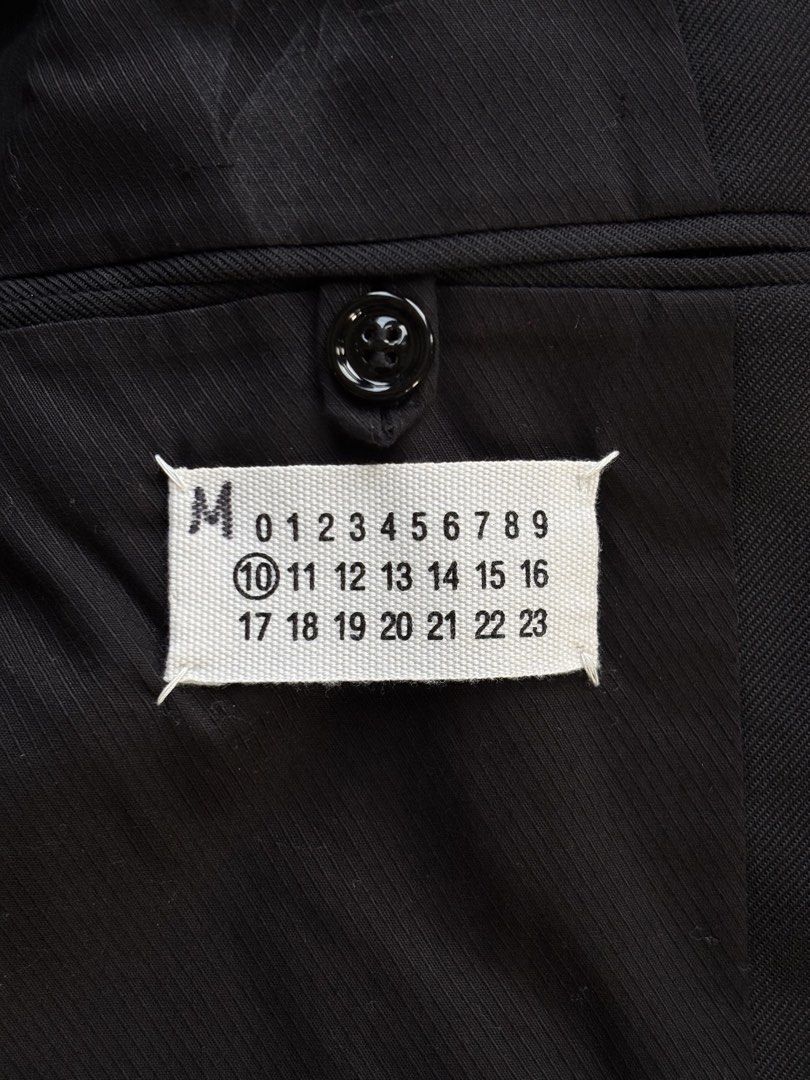 Maison Martin Margiela Single-Button “Card Pocket” Suit Jacket (Category: Luxury Apparel) located in Paranaque City. Submitted by grailonious (Listing ID 1455293614, Image 3). Description: size 46 slim fit. See the pictures for measurements Super minimal Margiela design. Features a notch on the chest pocket, which fits a standard ID card perfectly. Made in Italy Pristine new condition.