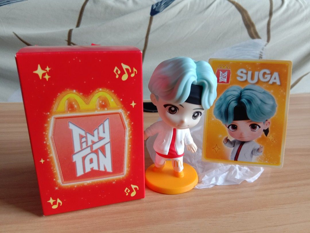 McD BTS Figurine (Suga) (Category: Designer & Blind Box Toys) located in Ampang. Submitted by keeperofturts (Listing ID 1455190332, Image 1). Description: Brand new. Open to swapping with any McD Squishmallow 💖 Box slightly dented, pls take note *Can request free if purchasing my Chimmy drawstring backpack.