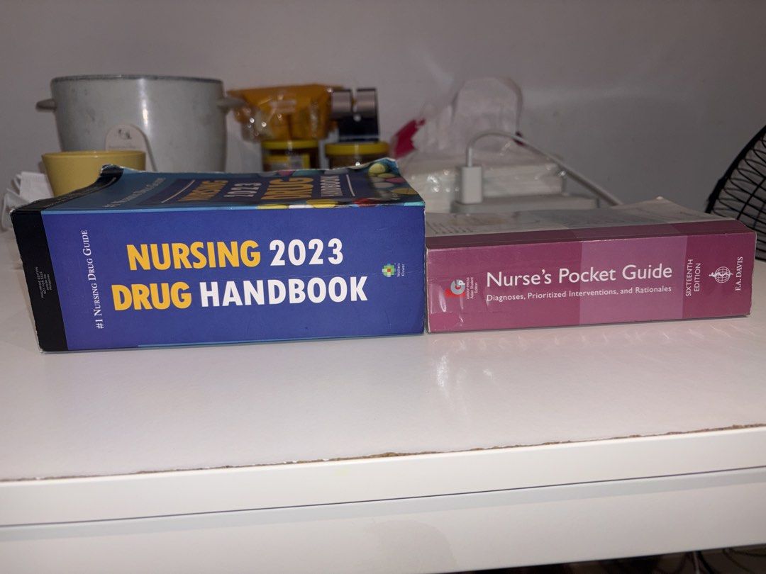NANDA and Drug Handbook SET (Category: Textbooks) located in Manila. Submitted by dhcrts_ (Listing ID 1455286246, Image 3). Description: WTS LFB PH FLASH SALE! NANDA and Drug Handbook 📌 Nurse's Pocket Guide (NANDA) [16th Edition] Condition: Lightly used with flaws barely noticeable (cover edges). Original copy with book cover. 📌 Drug Handbook (2023) Condition: Used with minor flaws (book cover). Original copy, but book cover is a bit wrinkled b