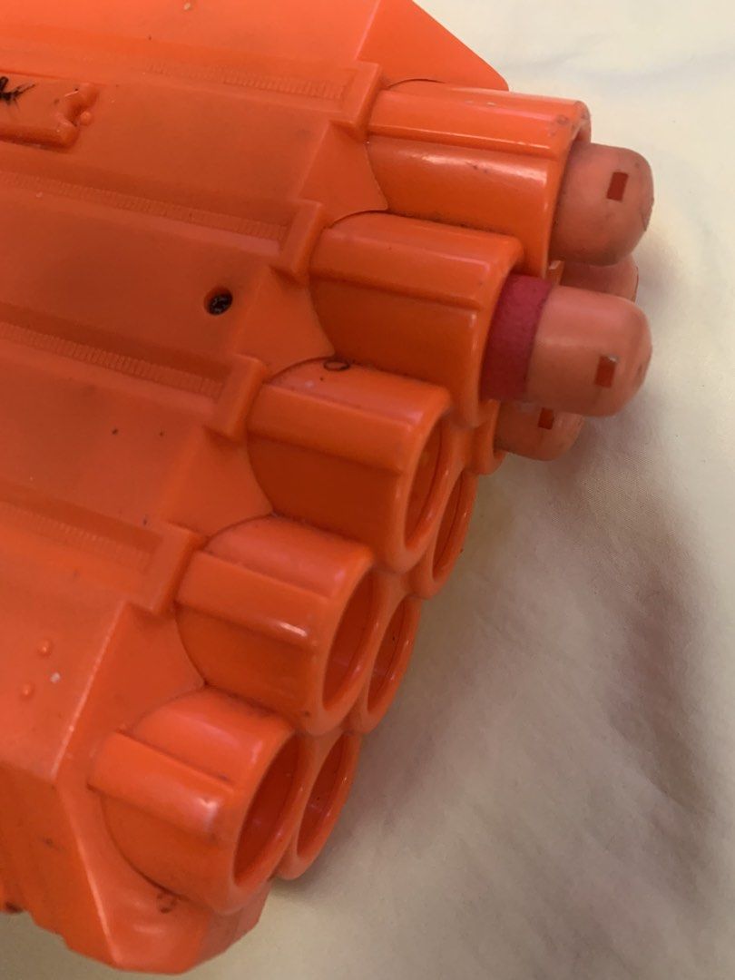 Nerf Mega Twinshock Blaster Toy Gun (Category: Action & Battle Toys) located in Manila. Submitted by labubu_lovelovelove (Listing ID 1455225600, Image 3). Description: - Nerf Mega Twinshock blaster - Color: Red and Orange - Fires two darts at once for double the action! - Ideal for outdoor play and epic battles - Shows minor scuffs from normal use, but fully functional and works well..