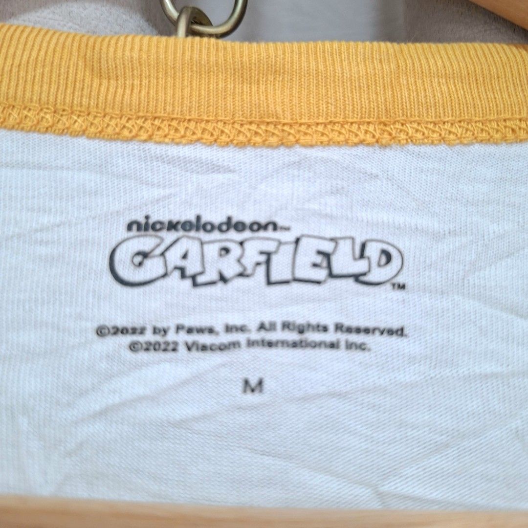 Nickelodeon Garfield White T-shirt Size M (Category: Tshirts & Polo Shirts ) located in Batangas. Submitted by sell_ph (Listing ID 1455172220, Image 3). Description: - White t-shirt with a fun Garfield graphic print - Features the official Nickelodeon Garfield logo on the tag - Made from comfortable and breathable 100% cotton - Size Medium (M) - Perfect for any Garfield enthusiast!.