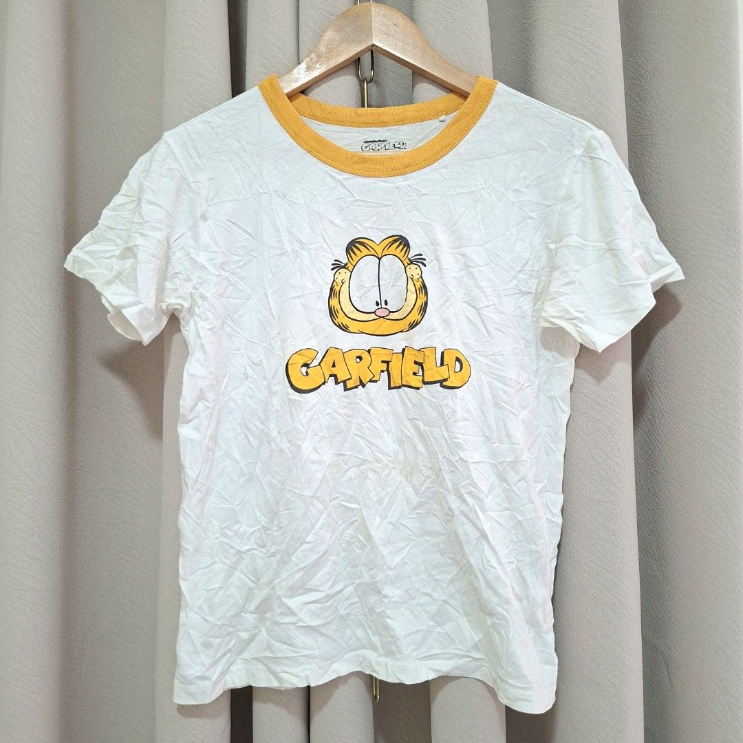 Nickelodeon Garfield White T-shirt Size M (Category: Tshirts & Polo Shirts ) located in Batangas. Submitted by sell_ph (Listing ID 1455172220, Image 1). Description: - White t-shirt with a fun Garfield graphic print - Features the official Nickelodeon Garfield logo on the tag - Made from comfortable and breathable 100% cotton - Size Medium (M) - Perfect for any Garfield enthusiast!.