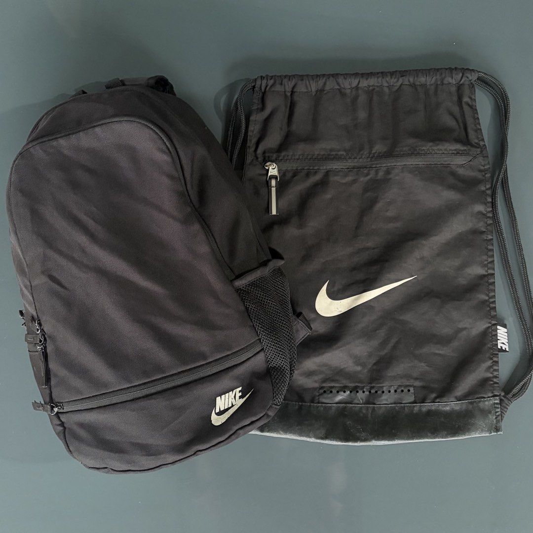 Nike Backpack and drawstring bag (Category: Backpacks) located in Manila. Submitted by precio (Listing ID 1455316103, Image 1). Description: - Authentic Nike backpack - Includes matching Nike drawstring bag - Color: Black - Condition: Good, pre-loved, no holes - Ideal for daily use, or school.