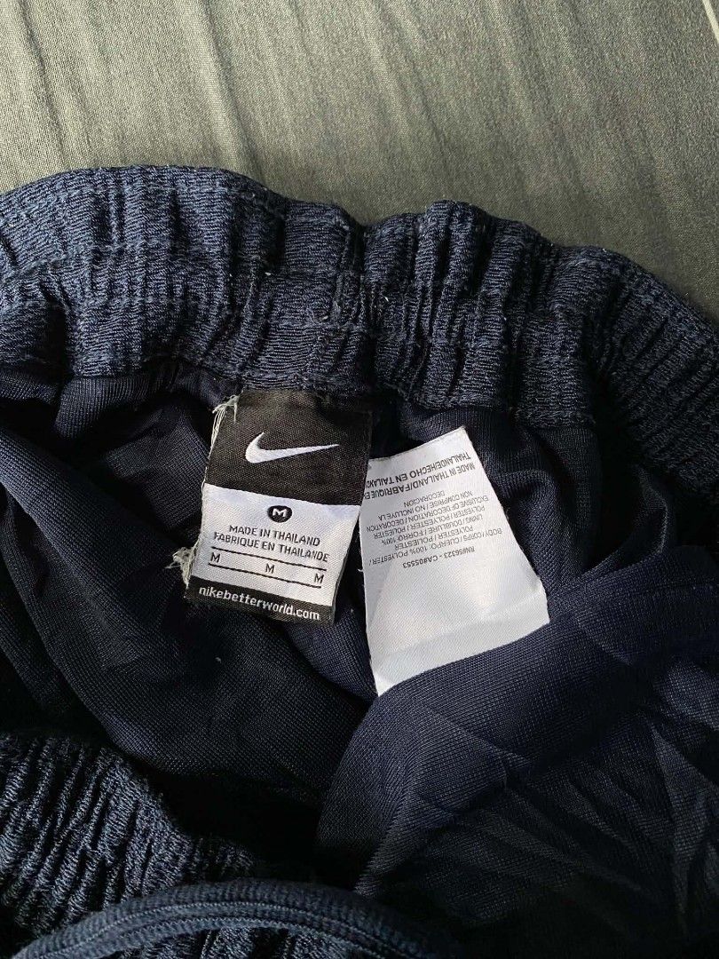 Nike Navy Blue Mesh Athletic Shorts Size M (Category: Shorts) located in Manila. Submitted by raymondrob54698 (Listing ID 1455172228, Image 3). Description: - Navy blue Nike athletic shorts - Breathable mesh material - Elastic waistband with drawstring - Small Nike swoosh logo on left leg - Ideal for sports and casual wear.