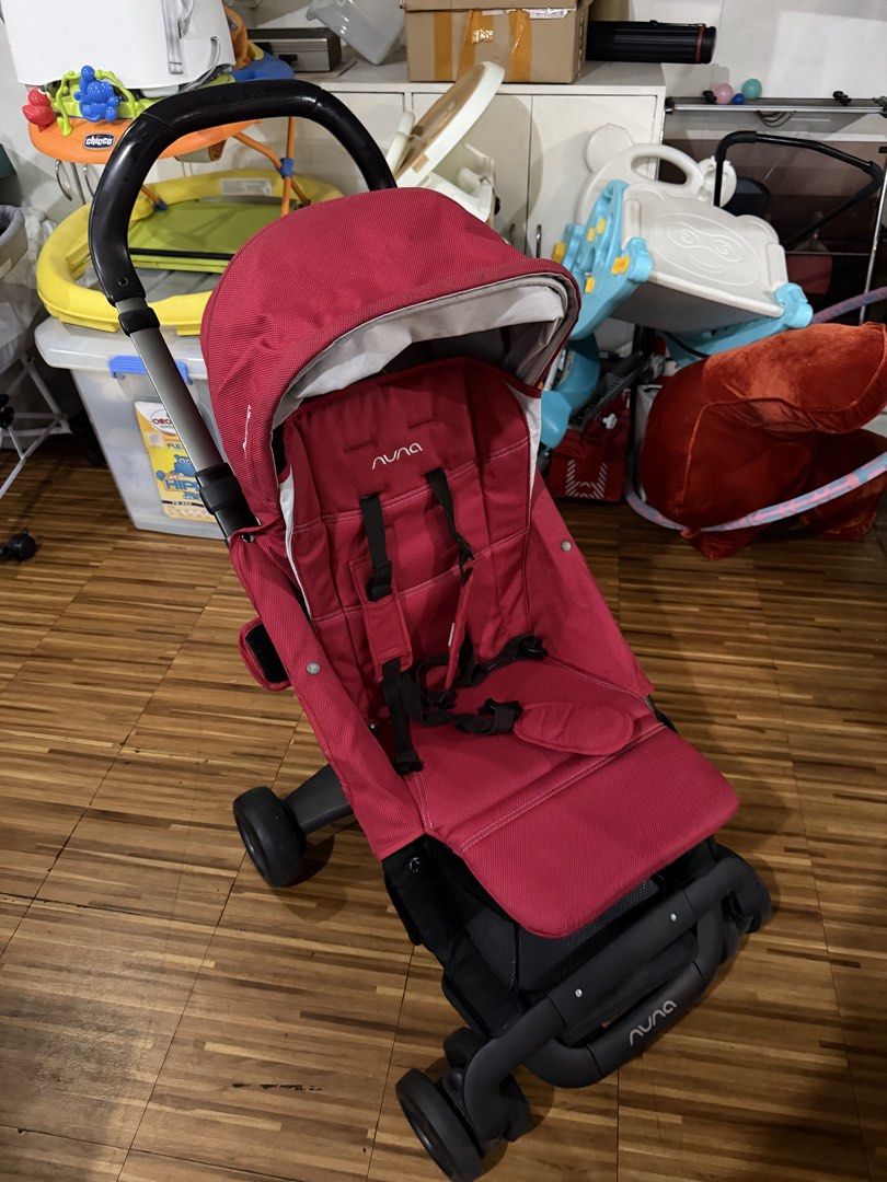 Nuna Pepp Stroller (Category: Strollers) located in Quezon City. Submitted by ghelrv (Listing ID 1455227526, Image 1). Description: - Nuna stroller in vibrant red - Lightweight and highly maneuverable - Secure 5-point safety harness - Provides sun protection with its canopy - Folds compactly for convenient storage - Ideal for busy, on-the-go families.