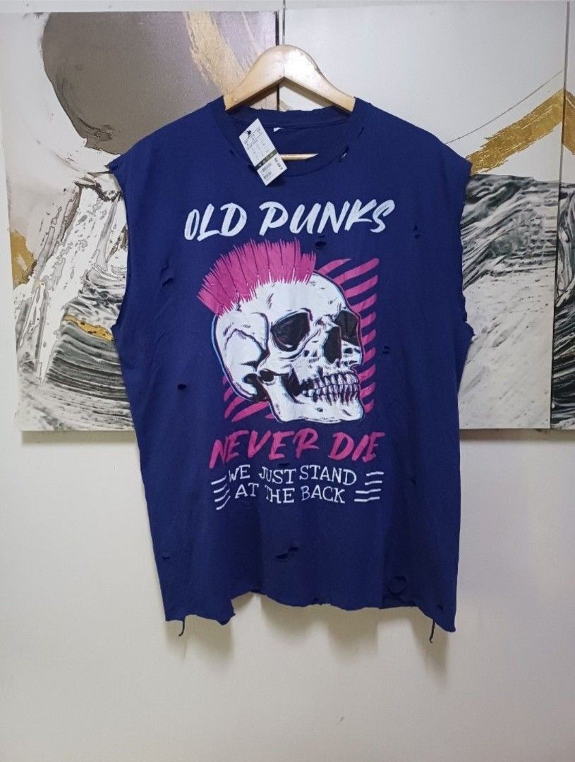 OLD PUNKS NEVER DIE DISTRESSED SLEEVE LESS SHIRT (Category: Activewear) located in Manila. Submitted by bvnnie (Listing ID 1455156955, Image 2). Description: OLD PUNKS NEVER DIE DISTRESSED SLEEVE LESS SHIRT Actual size using inches Armpit to Armpit/23 Lenght/29 fittings is Large to XL Excellent Condition, Issue:0 Message if you have any other question about sizing. A We do shipping nation wide I'm also open for video call so that you can see the 