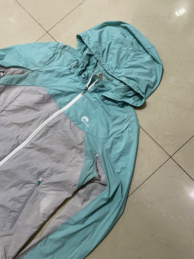 ONEPA OUTDOOR TWO TONE WOMENS RAIN JACKET (Category: Coats, Jackets and Outerwear) located in Talisay. Submitted by hustlethrift_2600 (Listing ID 1455320397, Image 2). Description: ONEPA OUTDOOR TWO TONE WOMENS RAIN JACKET M-L 19 W 24.5 L EXCELLENT CONDITION 9.8/10 COLOR RATE WATER RESISTAND QUICK DRY LIGHT WEIGHT ISSUE : BLACK STAIN ( HEM PART ) - 499 🏷️.