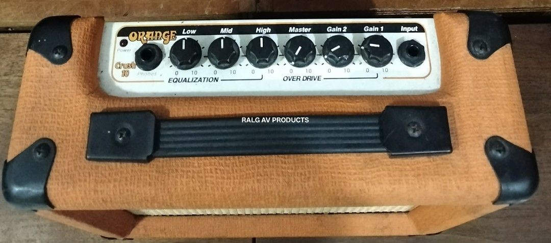 Orange Crush 10 Guitar Amplifier (Category: Musical Instruments) located in Bulacan. Submitted by ronald277077025 (Listing ID 1455233080, Image 3). Description: ORANGE PRACTICE GUITAR AMPLIFIER CRUSH 10 10 WATTS SOLID STATE POWER OUTPUT 6" ORANGE CUSTOM WOOFER GAIN 1 AND 2 CONTROLS MASTER VOLUME CONTROL EQ KNOBS( HIGH/MID/LOW) - 3 BAND EQUALIZER DIALS TO SHAPE TONE. INPUT/OUTPUT JACK TERMINALS 110 VOLTS( ADD 500 PESOS FOR TRANSFORMER) DIMENSIONS: