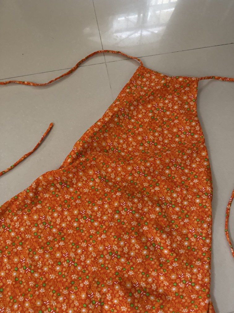 orange floral backless halter mini dress (Category: Dresses) located in Cavite. Submitted by vmlr_ (Listing ID 1455187785, Image 2). Description: ship from dasma cavite rfs: decluttering mop: bpi/maya/gcash/gogoexpress cod .