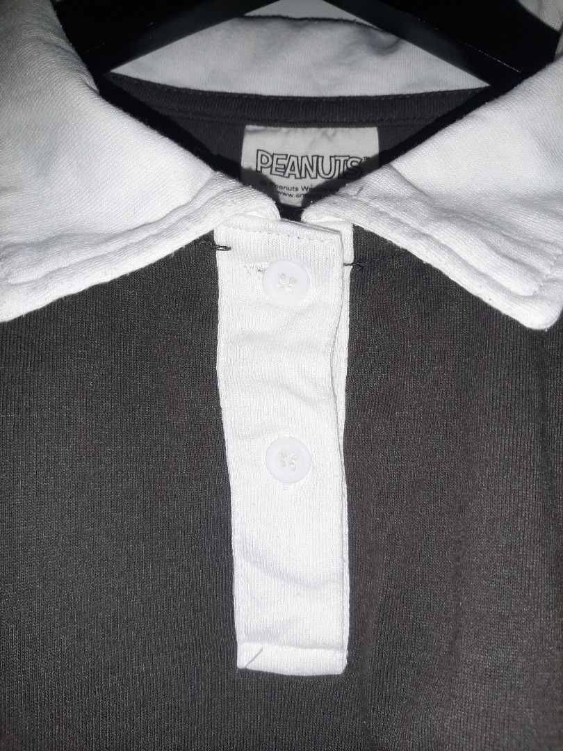 PEANUTS Dark Brown Polo Shirt (Womens) (Category: Shirts) located in Cavite. Submitted by dimesandthreadsph (Listing ID 1455291489, Image 3). Description: Take Note: Hindi ito pure cotton. 65% Polyester. 35% Cotton. Okay na okay pa ang condition. 9 over 10 condition. PEANUTS Dark Brown Polo Shirt (Womens) Price: 150ph Size: M Length: 19 Width: 20.5 - 21 Color Rate: 9/10 Good condition. No issue. No downpayment, no reservation. Color may vary due 