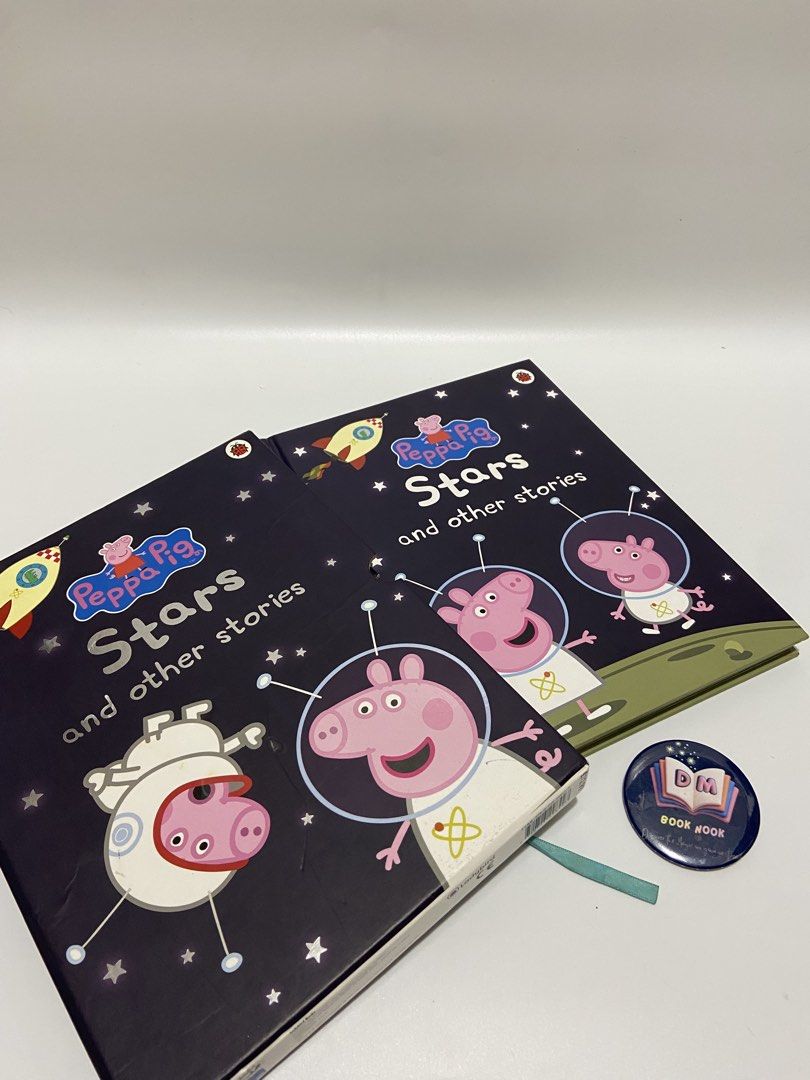 Peppa and Other Stories (Category: Children's Books) located in Caloocan City. Submitted by dmbooknook (Listing ID 1455256370, Image 2). Description: - VGUC, may tape repair sa 2 pages | Stories and Illustrations are intact - Hardcover with slipcase & ribbon bookmark | Collectors edition PEPPA PIG: STARS AND OTHER STORIES 🚀✨ Complete set with slipcase! 8 fun adventures in 1 About the Book: A hardcover story collection with slipcase featuring Pep