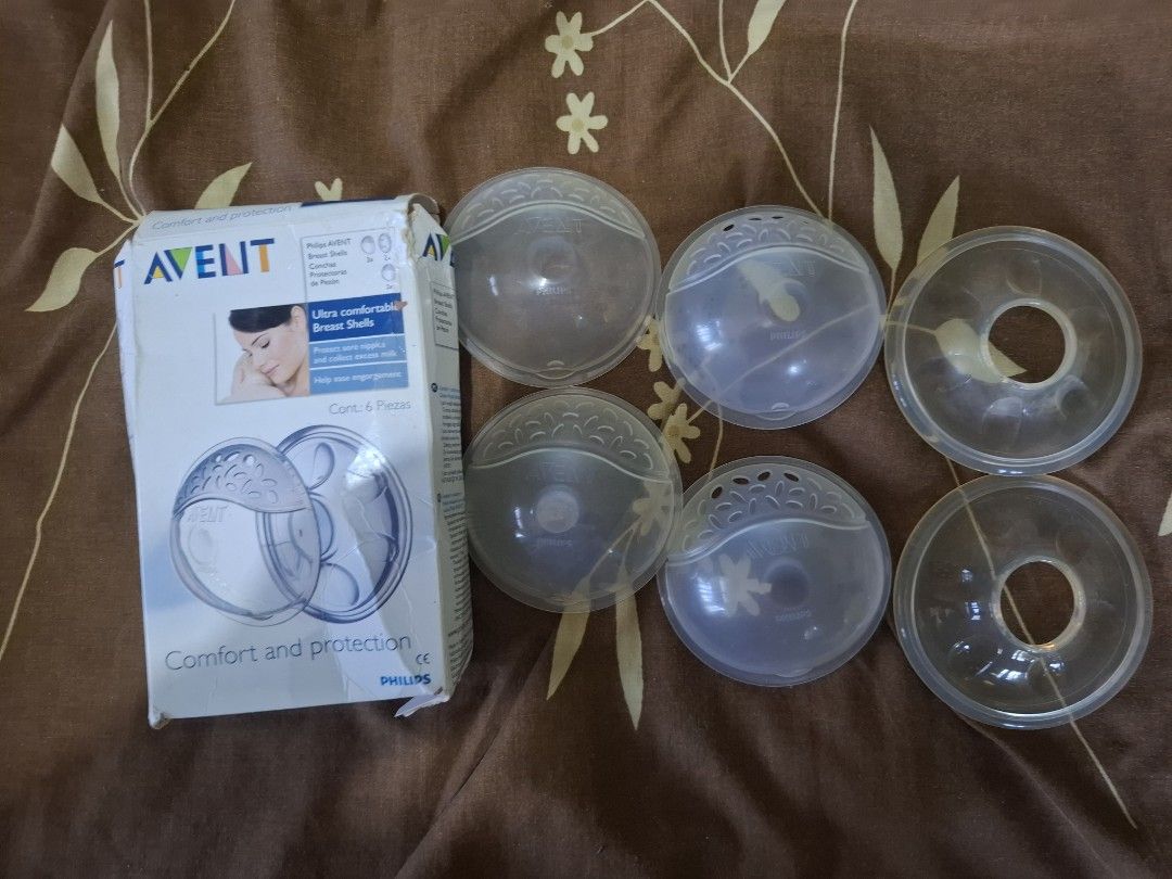 Philips Avent Ultra Comfortable Breast Shells (Category: Breastfeeding & Bottle Feeding) located in Davao. Submitted by skyefinds (Listing ID 1455207509, Image 1). Description: - Philips Avent Breast Shells (6 pieces) - Protects sore and cracked nipples - Collects leaking breast milk - Provides comfort and protection - Includes original packaging.