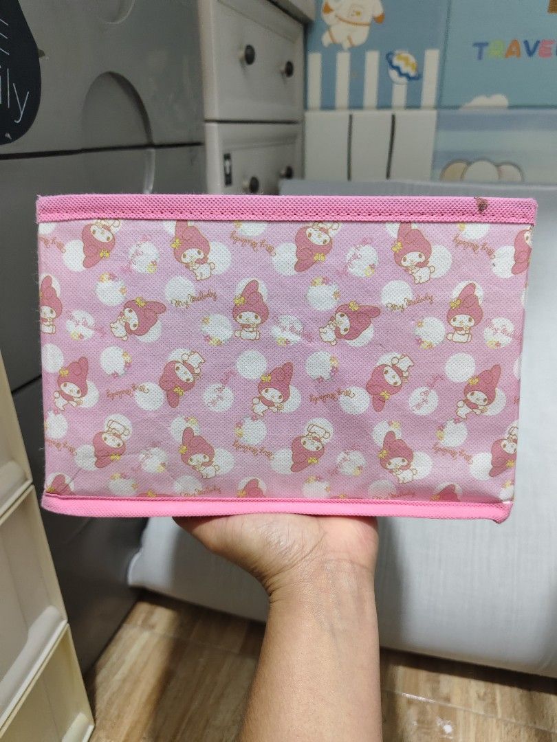 Pink My Melody Storage Box Organizer (Category: Storage Boxes & Baskets) located in Makati City. Submitted by abegailbrezuela (Listing ID 1455244312, Image 3). Description: - Adorable pink storage box featuring My Melody. - Ideal for organizing small items like stationery, accessories, or knick-knacks. - Folds flat for convenient storage when not in use. - Perfect for tidying up desks, shelves, and drawers. - Adds a cute and functional touch to y