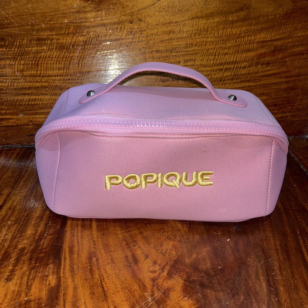 Popique Travel Makeup Pouch (Category: Purses & Pouches) located in Manila. Submitted by declutter.diaries (Listing ID 1455181402, Image 1). Description: Popique travel makeup pouch - original Popique - rfs used only 1 week for a vacay - good for traveling, has lots of compartments inside - has minimal makeup stain in pouch (see photos).