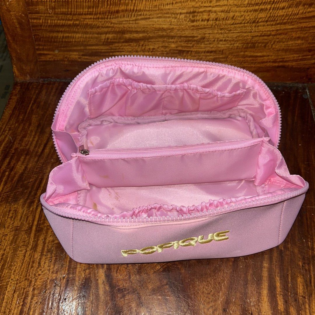 Popique Travel Makeup Pouch (Category: Purses & Pouches) located in Manila. Submitted by declutter.diaries (Listing ID 1455181402, Image 2). Description: Popique travel makeup pouch - original Popique - rfs used only 1 week for a vacay - good for traveling, has lots of compartments inside - has minimal makeup stain in pouch (see photos).