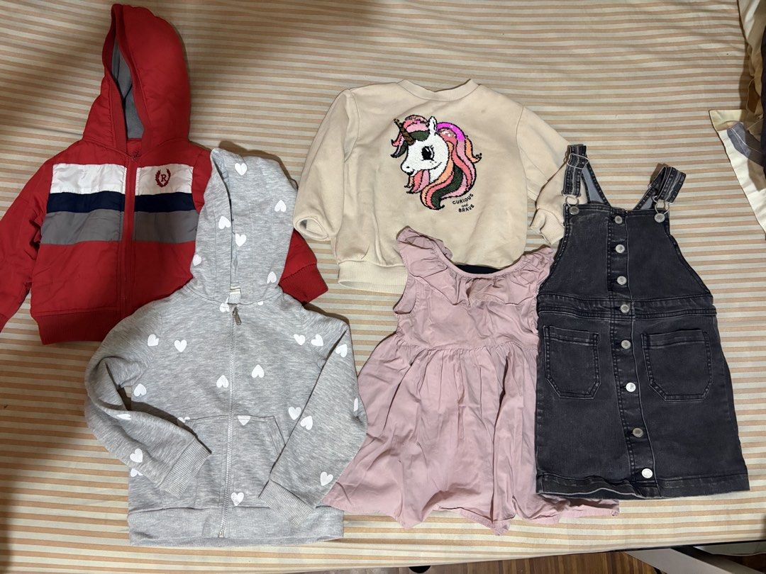 Preloved bundle clothes 2-3 yo girl (Category: Babies & Kids Fashion) located in Cavite. Submitted by declutterbymeee (Listing ID 1455199108, Image 2). Description: Take all 799php - Bundle of girls' clothes - Includes: dresses, green floral jumpsuit, pink cardigan, fluffy pink top, cream unicorn sweatshirt, grey heart hoodie, red jacket, denim overall dress Mostly branded po For 2-3 yo baby girl Loc: san pedro laguna Shipping thru j&t.
