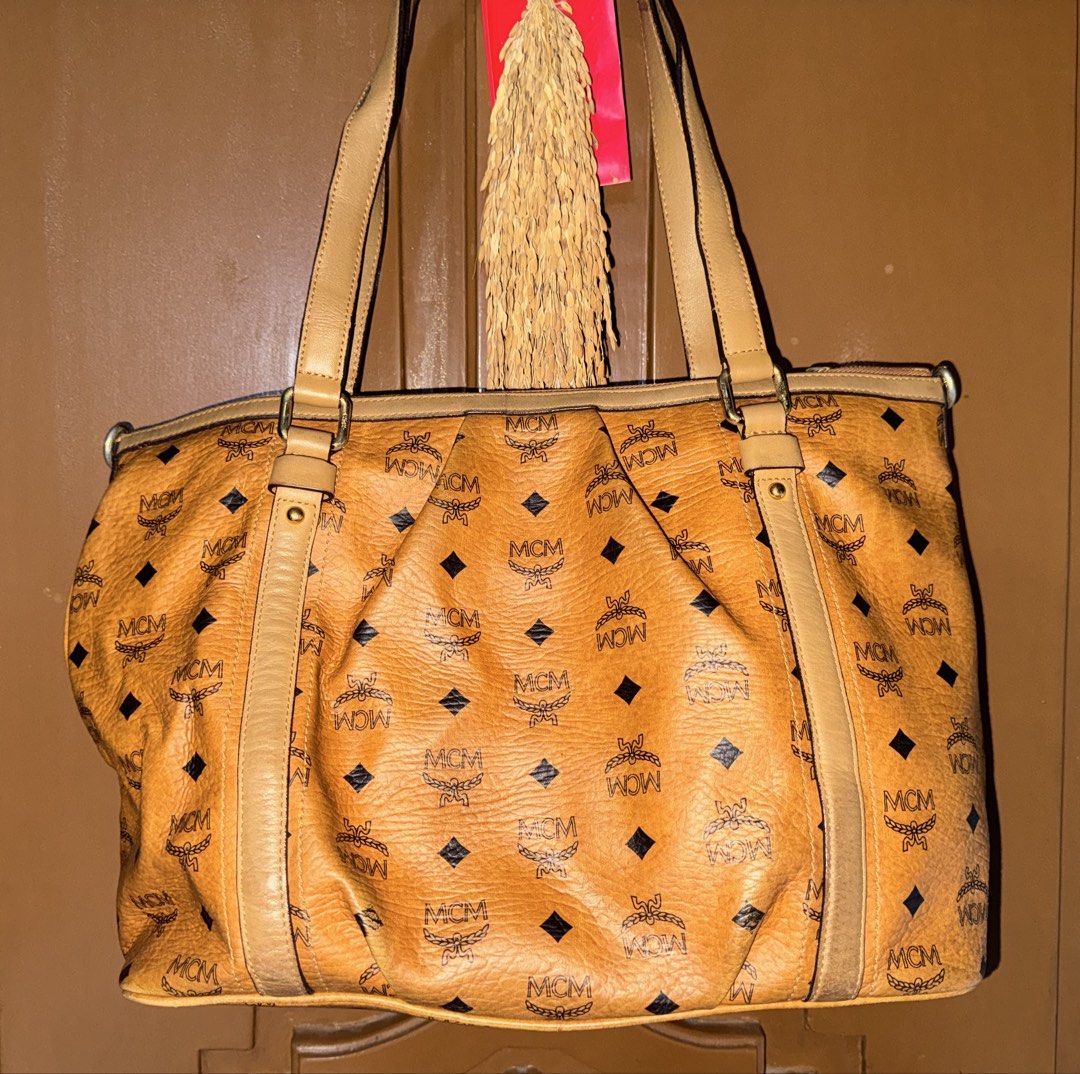 Preloved MCM Bag (Category: Luxury Bags & Wallets) located in Muntinlupa City. Submitted by ivy_1223 (Listing ID 1455231584, Image 2). Description: Preloved Original MCM No receipt, no dustbag Well used Slightly negotiable.