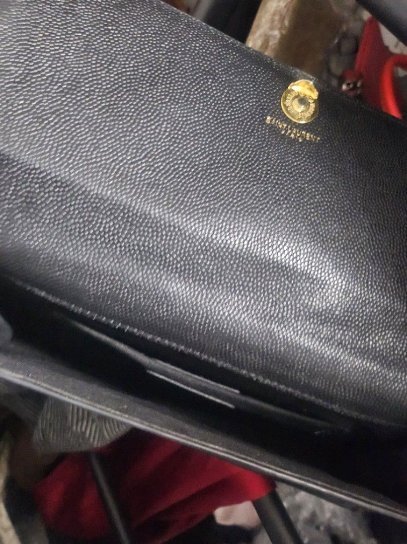 Preloved YSL clutch (Category: Luxury Bags & Wallets) located in Tacloban City. Submitted by re_store23 (Listing ID 1455205278, Image 3). Description: •Please manage your Expectations this is prelove and not brandnew! •Uk@y source po ito but selected kaya maayos pa po. •Clutch bag lang walang sling or lagayan ng sling. •Medyo mahaba po •Coded •What you see is what you get..