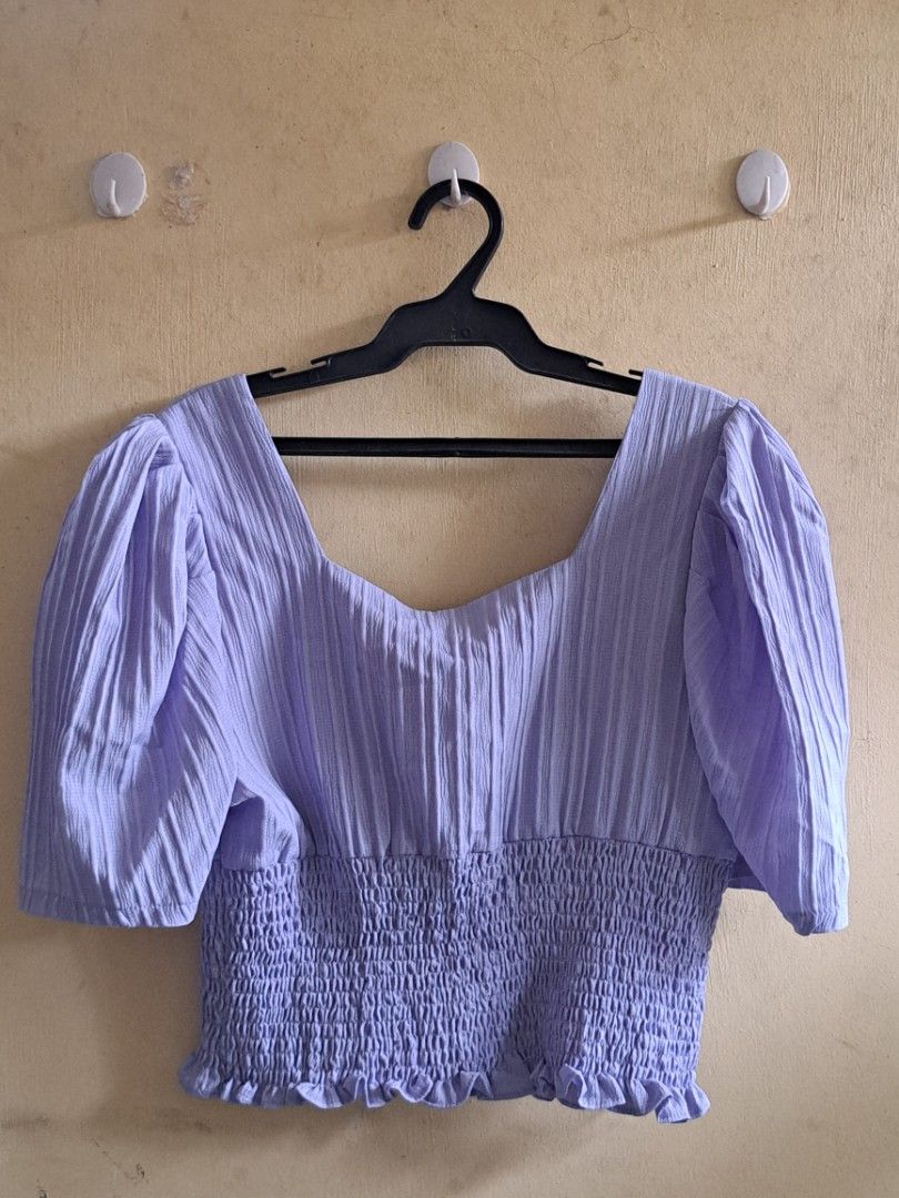 Purple Smocked Puff Sleeve Crop Top (Category: Blouses) located in San Pedro. Submitted by yoonvminki (Listing ID 1455154010, Image 2). Description: •Worn multiple times, but still in good condition •Best fits sizes M •Purple on photos but almost blue-ish in person •Very pretty when worn Shipping fee will be shouldered by buyer. Prices are negotiable, please make an offer 🙇‍♀️ 🔴 Strictly payment first before shipment. MOP: Gcash.