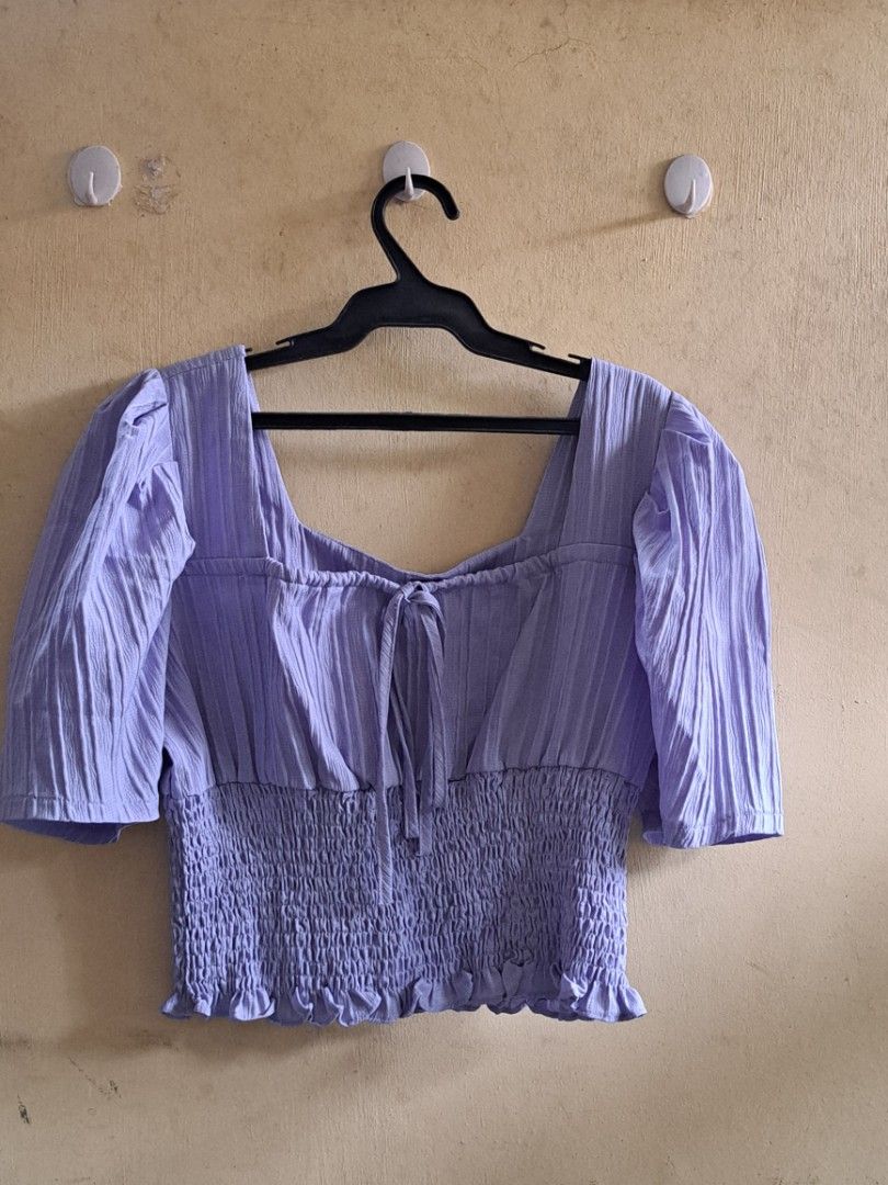 Purple Smocked Puff Sleeve Crop Top (Category: Blouses) located in San Pedro. Submitted by yoonvminki (Listing ID 1455154010, Image 1). Description: •Worn multiple times, but still in good condition •Best fits sizes M •Purple on photos but almost blue-ish in person •Very pretty when worn Shipping fee will be shouldered by buyer. Prices are negotiable, please make an offer 🙇‍♀️ 🔴 Strictly payment first before shipment. MOP: Gcash.