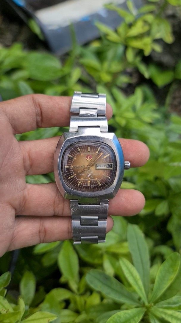 Rado Day/Date Automatic Watch (Category: Luxury Watches) located in San Mateo. Submitted by gk2900504184839 (Listing ID 1455244476, Image 1). Description: - Vintage Rado Automatic Watch - Day and Date Complication - Original Stainless Steel Bracelet - Original Crown - Beautiful Sunburst Dial Pattern - Case shows some signs of wear - Runs well.