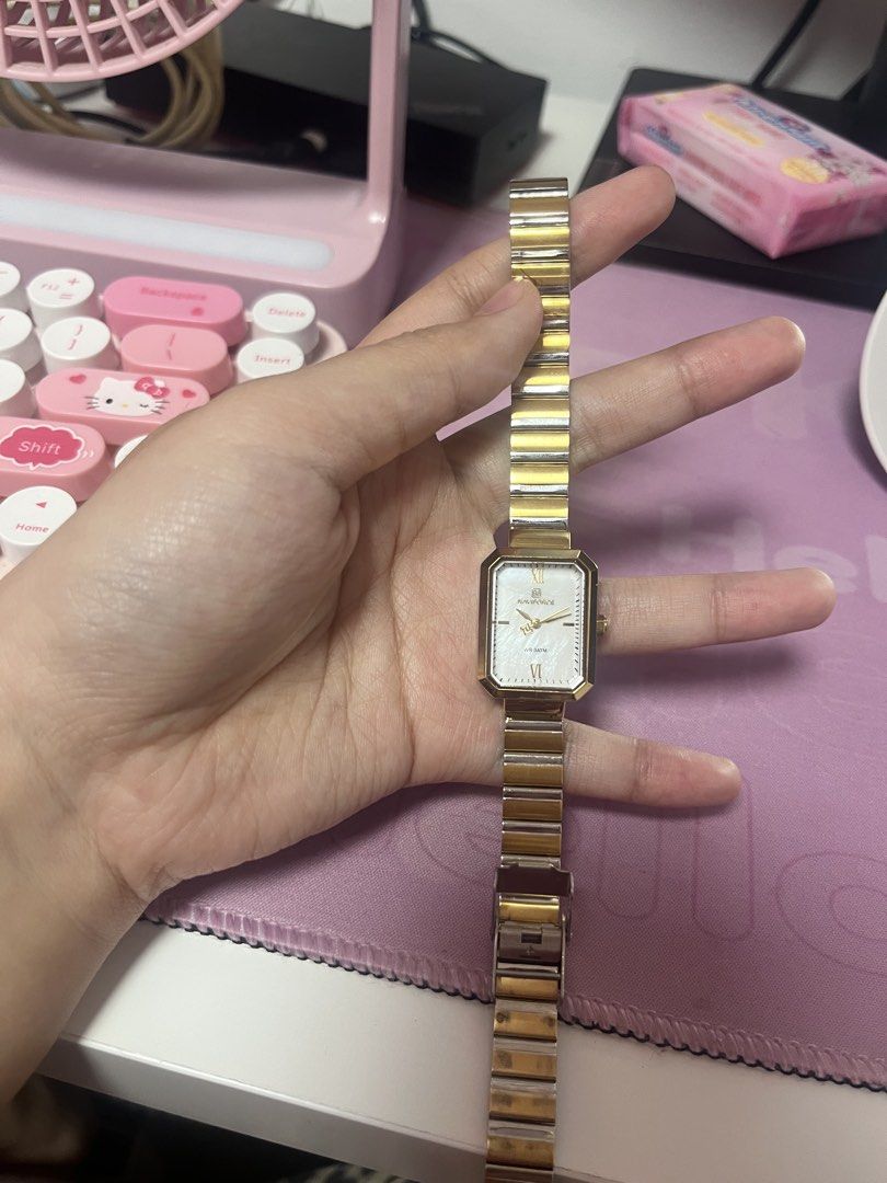 Watch Two-Tone Stainless Steel (Category: Luxury Watches) located in Muntinlupa City. Submitted by araberroya (Listing ID 1455314457, Image 1). Description: - Authentic Rado quartz watch - Two-tone stainless steel band - Rectangular face with a beautiful mother-of-pearl dial - Classic Roman numeral hour markers - Works perfectly and keeps great time - Ideal for both daily wear and special events - Timeless and elegant design.