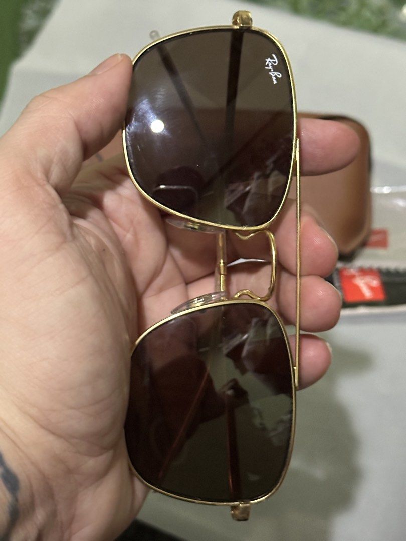 Ray-Ban Square Sunglasses Gold Frame Brown Lens (Category: Sunglasses & Eyewear) located in Rodriguez. Submitted by mnl_premium_essentials (Listing ID 1455211389, Image 3). Description: Authentic Ray-Ban sunglasses Gold frame with brown lenses Classic square shape Includes original case and cleaning cloth Ideal for everyday wear Stylish eye protection Lightly used Can ship via lalamove or J&T, cost c/o buyer 📍Rodrigruez, Rizal.