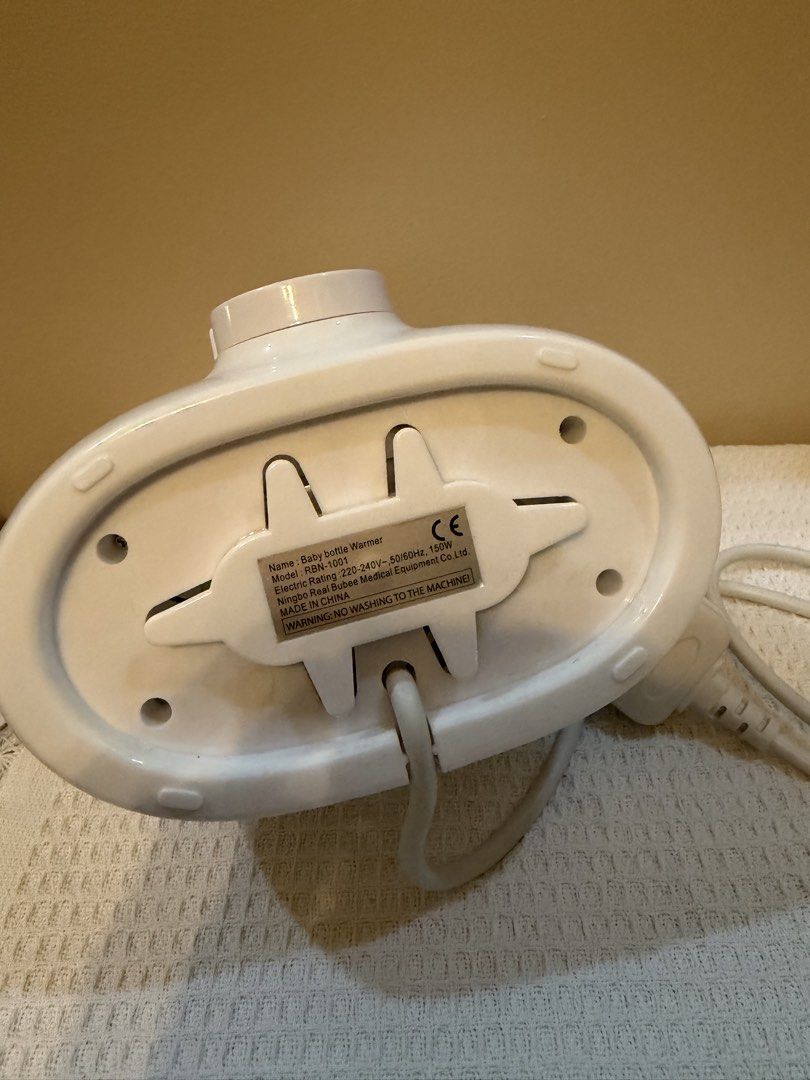 real bubee bottle warmer (Category: Breastfeeding & Bottle Feeding) located in Quezon City. Submitted by 89d880b481efe96149932945693e81 (Listing ID 1455287563, Image 3). Description: Real Bubee baby bottle warmer - good as new for lalamove or shipping LAST PRICE POSTED.