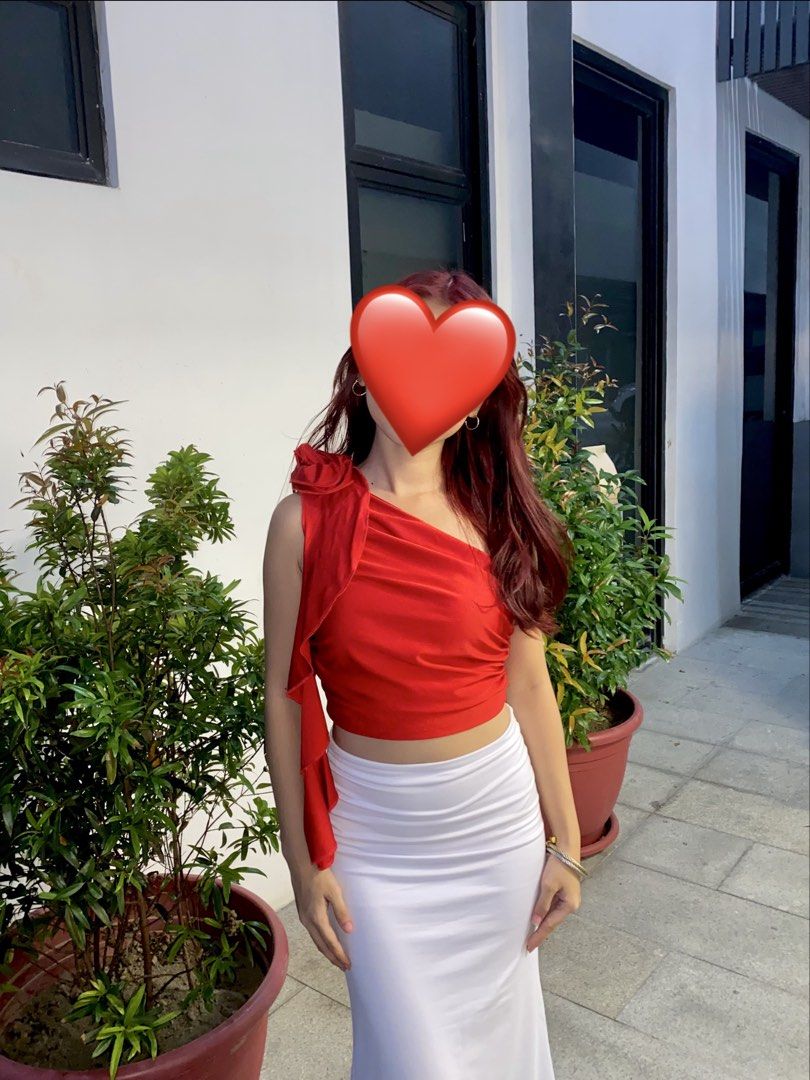 Red One Shoulder Crop Top with Ruffle Detail (Category: Sleeveless) located in Quezon City. Submitted by trendychic1919 (Listing ID 1455199012, Image 2). Description: - Trendy red one-shoulder crop top - Adorable ruffle detail on the shoulder strap - Used once - Size: S - Mode of payment: Gcash (Payment first) - Mode of delivery: Lalamove/Joyride/Angkas - Buyer is in charge of delivery fee - No cancellation once shipped - Location: Quezon City, n