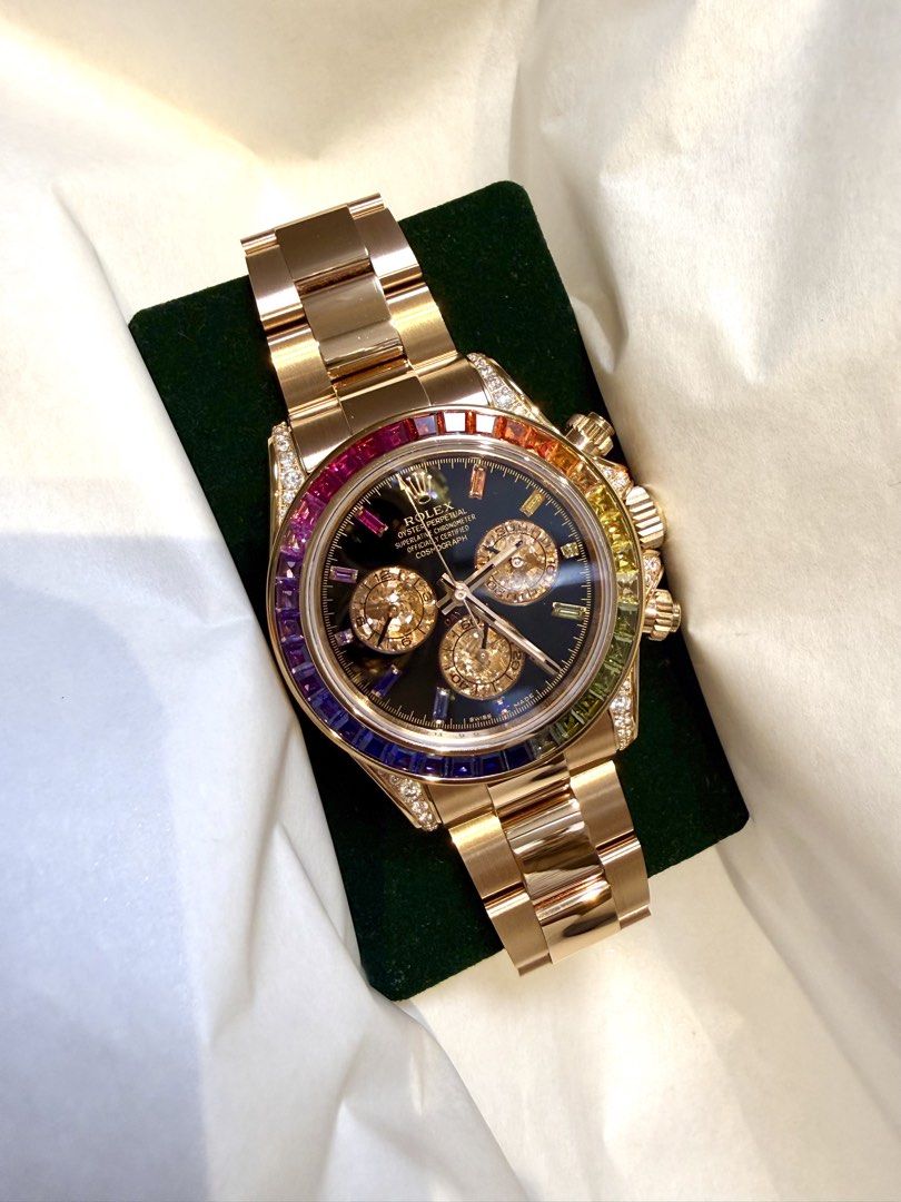 Rolex Daytona Rainbow (Category: Luxury Watches) located in Manila. Submitted by poppyany (Listing ID 1455277554, Image 1). Description: Rolex Daytona Rainbow in Rose Gold. Swiss. Moissanite stones with zirconia rainbow gems. Comes with the clear case only. Bought this at 55K. .