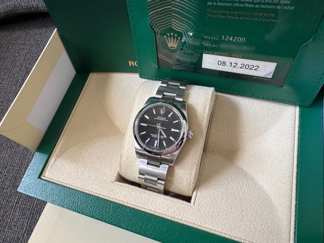 Rolex Oyster Perpetual 124200 Black Dial (Category: Watches) located in Singapore. Submitted by stammer (Listing ID 1455273459, Image 2). Description: - Rolex Oyster Perpetual 124200 - Stunning Black Dial - Purchased on 08.12.2022 - Comes with Original Box - Includes Original Warranty Card - Versatile for daily wear or special events - Serious buyers welcome.