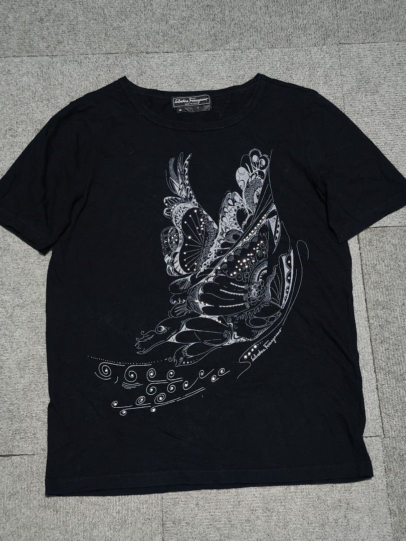 Salvatore Ferragamo Butterfly Tee (Category: Blouses) located in La Trinidad. Submitted by beenaged (Listing ID 1455177509, Image 1). Description: - Salvatore Ferragamo black t-shirt - Size M Medium women's armpit to armpit 18.5 inches shoulder to hem 23.5 inches Excellent price 880 location Baguio City shipping nationwide .