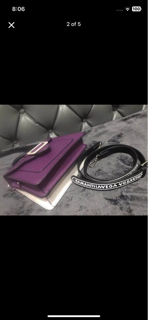 Samantha Vega Purple Structured Handbag with Strap (Category: Luxury Bags & Wallets) located in Manila. Submitted by inah.kei (Listing ID 1455255514, Image 2). Description: - Samantha Vega structured handbag in purple - Top handle and detachable shoulder strap with logo print - Secure buckle closure on front flap - Interior with multiple compartments - Elegant silver hardware details - Versatile for everyday or special occasions ko.