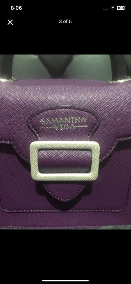 Samantha Vega Purple Structured Handbag with Strap (Category: Luxury Bags & Wallets) located in Manila. Submitted by inah.kei (Listing ID 1455255514, Image 3). Description: - Samantha Vega structured handbag in purple - Top handle and detachable shoulder strap with logo print - Secure buckle closure on front flap - Interior with multiple compartments - Elegant silver hardware details - Versatile for everyday or special occasions ko.