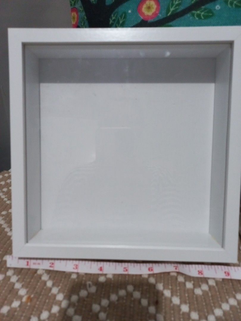 Set of 2 White Square Shadow Box Frames (Category: Frames & Pictures) located in Naga. Submitted by greatchance (Listing ID 1455202217, Image 2). Description: - Set of 2 white square shadow box frames - Ideal for displaying small items or photos - Features 3D display depth - Versatile: can be wall-mounted or used on a shelf - Frames are clean and ready for use.