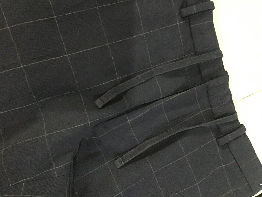 Smart ankle 2 way stretch Windowpane (Category: Trousers) located in Manila. Submitted by sandobag (Listing ID 1455209516, Image 3). Description: W 32-34 L 37 Excellent condition Color rate;10/10 - Navy blue pants with a classic checkered pattern. - Features a comfortable drawstring waist for a customizable fit. - Crafted from a durable polyester blend. - Versatile for both casual outings and smart-casual occasions. - Offers a blend of comfort an