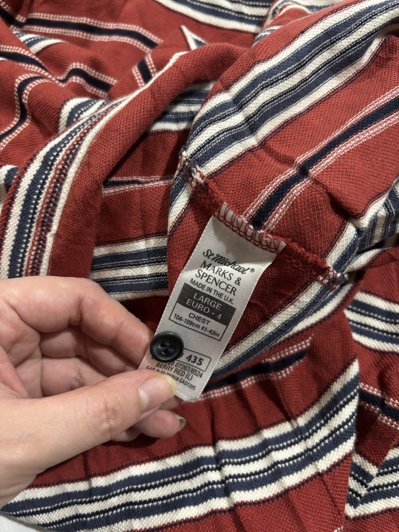St Michael Marks & Spencer Striped Polo Shirt - Large (Category: Tshirts & Polo Shirts ) located in Iloilo. Submitted by iconicangie (Listing ID 1455300931, Image 3). Description: - Classic St Michael polo shirt - Red, white, and blue stripes - Navy collar and button placket - Size: Large - Made in the UK - Ideal for casual wear.
