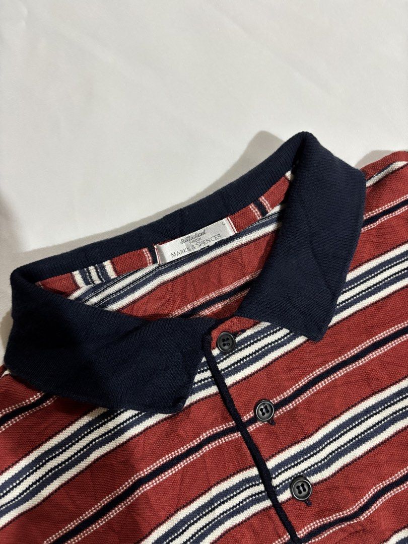 St Michael Marks & Spencer Striped Polo Shirt - Large (Category: Tshirts & Polo Shirts ) located in Iloilo. Submitted by iconicangie (Listing ID 1455300931, Image 2). Description: - Classic St Michael polo shirt - Red, white, and blue stripes - Navy collar and button placket - Size: Large - Made in the UK - Ideal for casual wear.