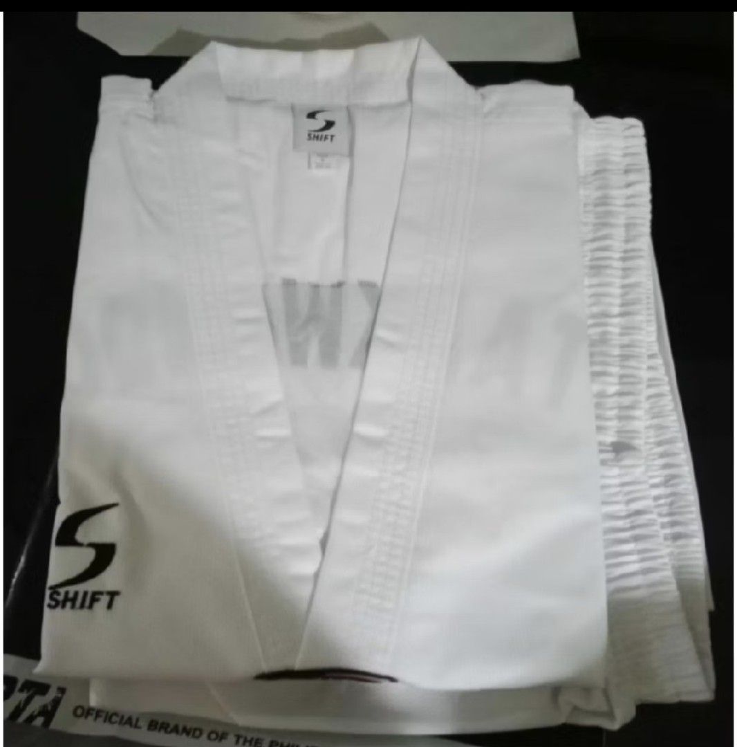 Shift Elite Ribbed Taekwondo Uniform PTA Official (Category: Combat Sports) located in Batangas. Submitted by ceejayc (Listing ID 1455236070, Image 2). Description: - Official Taekwondo uniform for training and promotion tests. - Made from a comfortable and durable 65% cotton, 35% polyester blend. - Features premium ribbed fabric for enhanced durability. - Set includes the uniform top, pants, and belt. - Ideal for all Taekwondo practitioners. siz