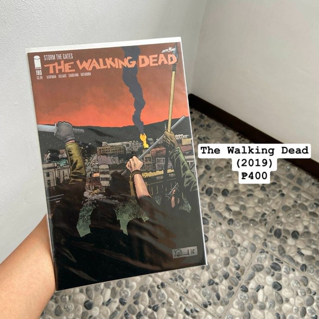 THE WALKING DEAD COMIC BOOKS (2019 & 2017) (Category: Comics & Manga) located in Rizal. Submitted by chloeysabelperez-gonzalez (Listing ID 1455229977, Image 1). Description: - Two (2) The Walking Dead comic issues included. - Issue 180 from 2019. - One issue from 2017. - Both comics are in protective sleeves. - Perfect for any Walking Dead enthusiast. - Price is for the set of two comics. THE WALKING DEAD COMIC BOOKS Please check photos for detai