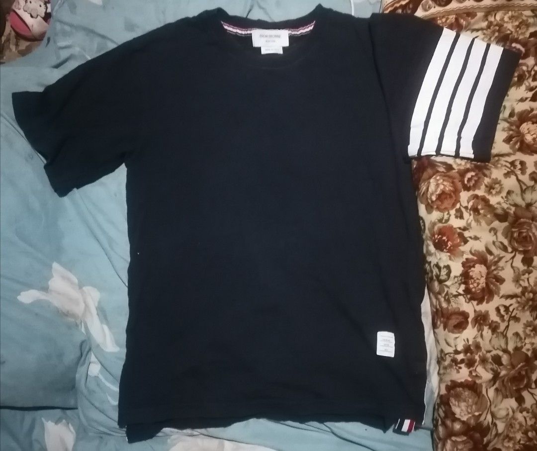 Thom browne (Category: Tshirts & Polo Shirts ) located in San Carlos City. Submitted by apyogone (Listing ID 1455210988, Image 1). Description: Thom browne Size 2 Excellent condition No issue Color rate 9.9.