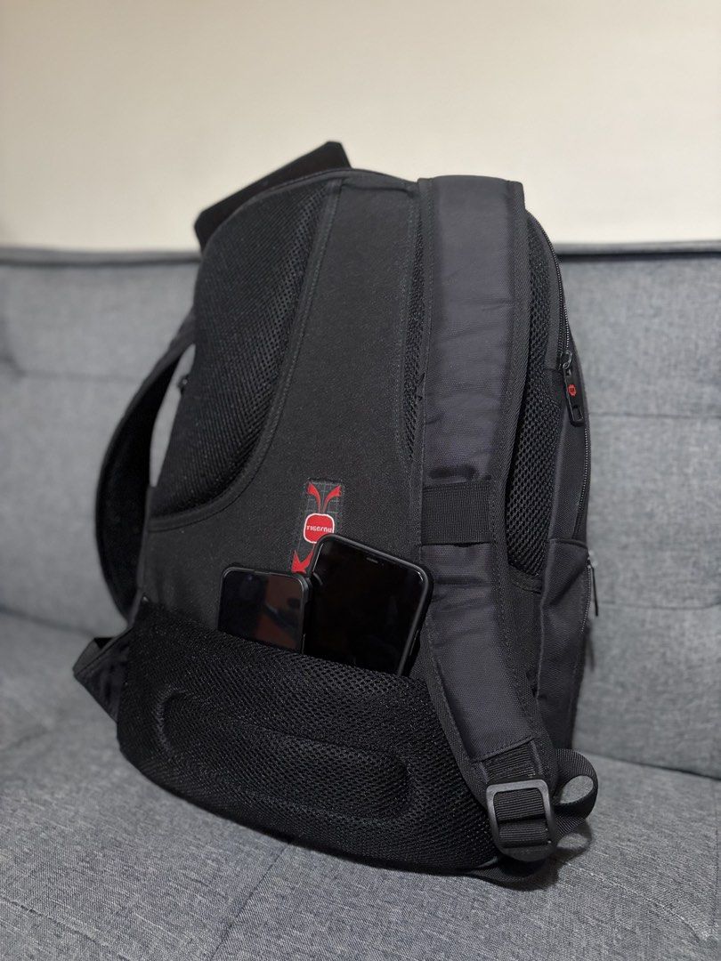 Tigernu Bag (Category: Laptop Bags & Sleeves) located in Manila. Submitted by precio (Listing ID 1455315974, Image 2). Description: - Brand: Tigernu - Bought: in Japan 🇯🇵 - Features: Multiple pockets and 2 hidden ones at the back, perfect for laptops, valuables, and phones.